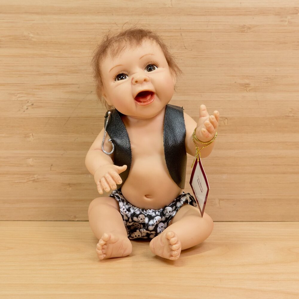 Ashton Drake Galleries Porcelain "I was Born to Rock, Dude" Baby Doll Figurine